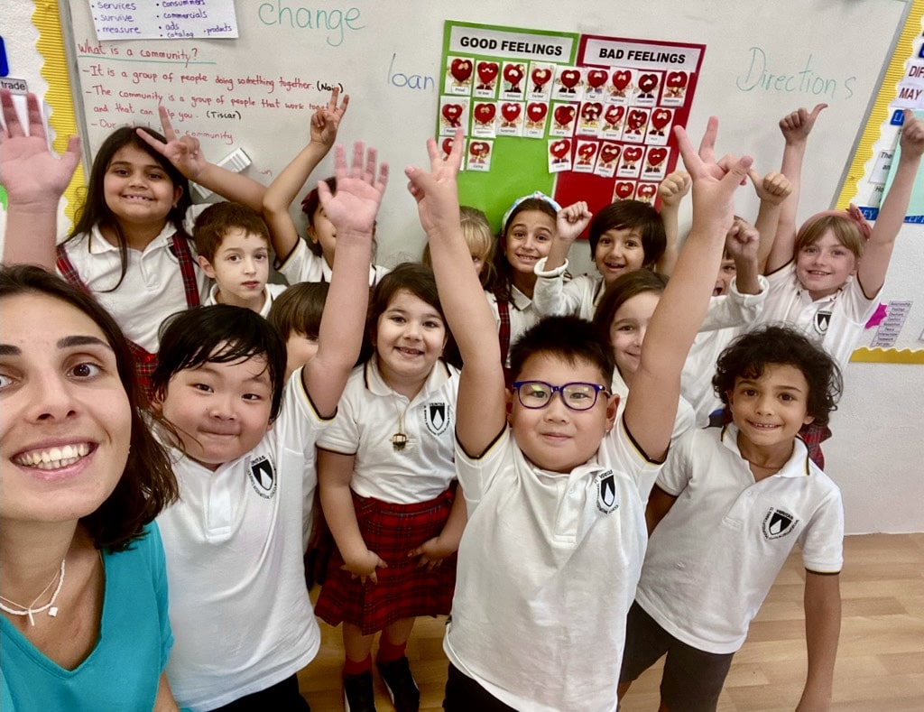 Happy students and teachers at St. Dominic's International School, showcasing the nurturing environment and exceptional programs offered.